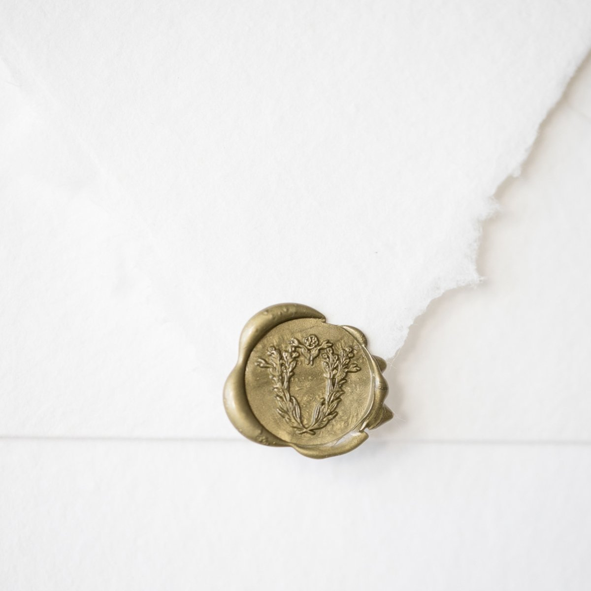 Wax seal to personalize wedding invitations