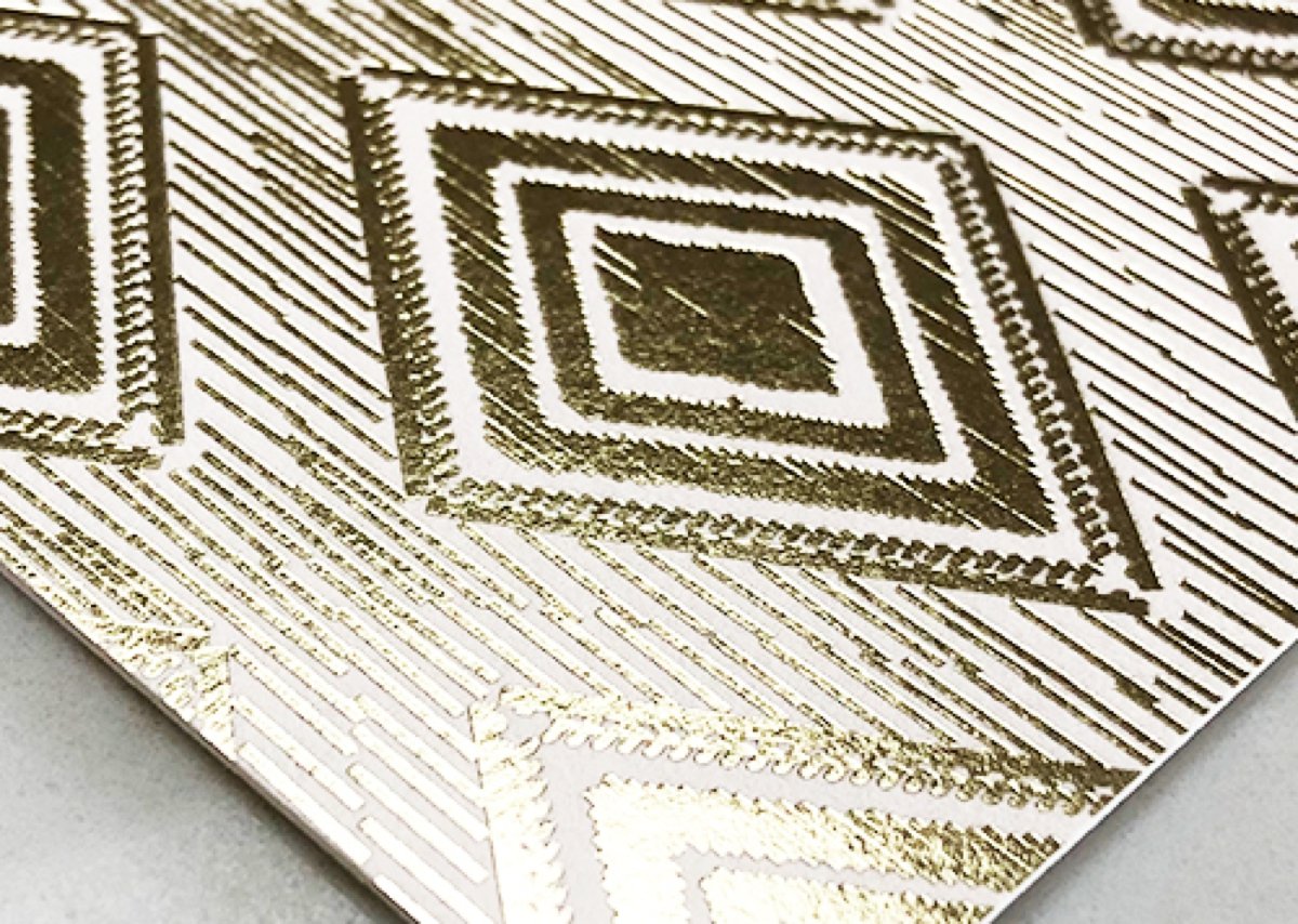 Close-up of a foil stamped wedding invitation