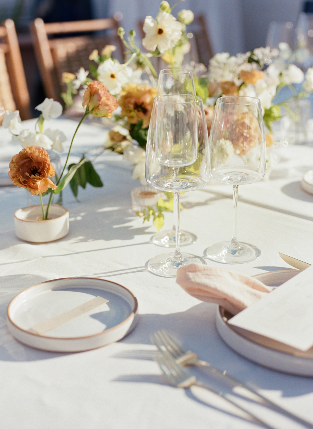 White and terracotta wedding table décor