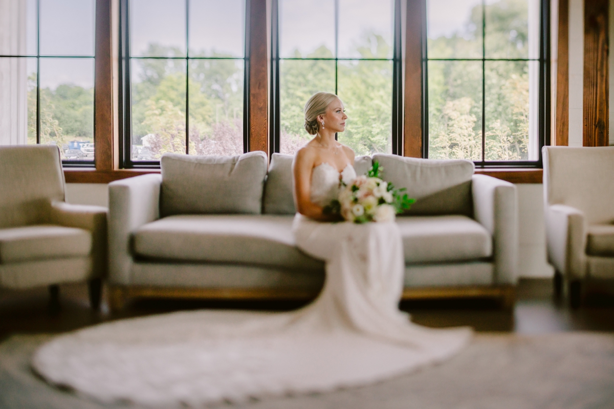 Bride sitting in the getting ready suite at Kent Island Resort