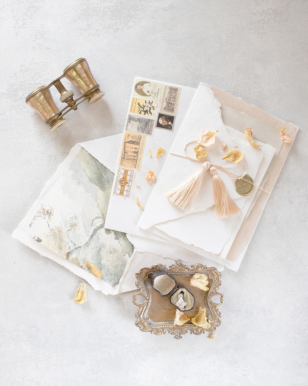 A wedding envelope with vintage stamps and a wax seal 