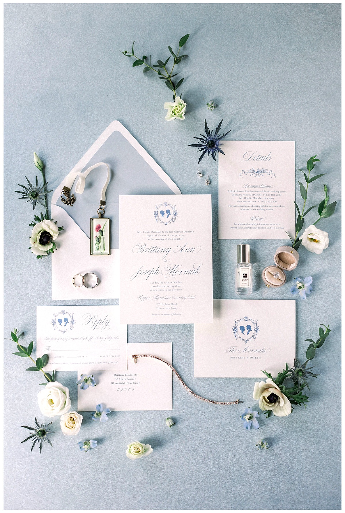 A flat lay of a semi-custom wedding invitation suite at the Upper Montclair Country Club in Clifton, NJ